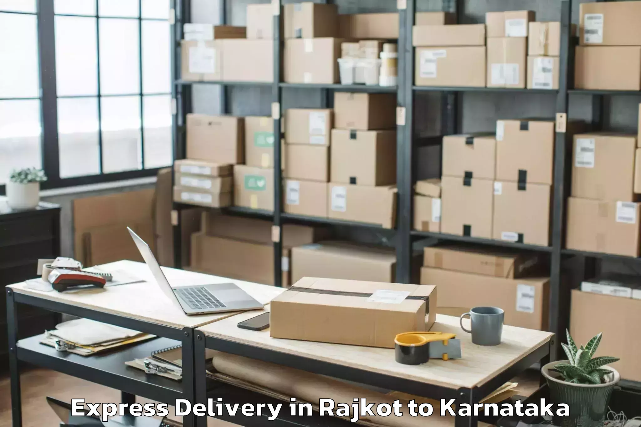 Book Rajkot to Visvesvaraya Technological Uni Express Delivery Online